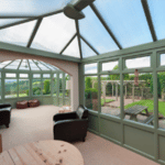VEKA UPVC Chartwell Green Traditional Conservatory with Chartwell Green Colour UPVC Casement Windows with a Top Opener
