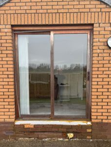 Before Image of wooden Sliding Patio doors
