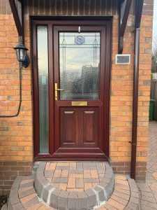 Old uPVC Rosewood door with decorative glass and gold hardware