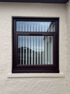 New rosewood casement uPVC window with opener and vent