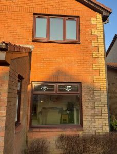 New casement windows in rosewood with satin chrome hardware