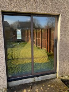 Old Rosewood Sliding Patio door in Lochwinnoch